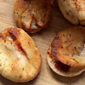 Mini Cheesy Pizza Pockets: Bite-Sized Delight